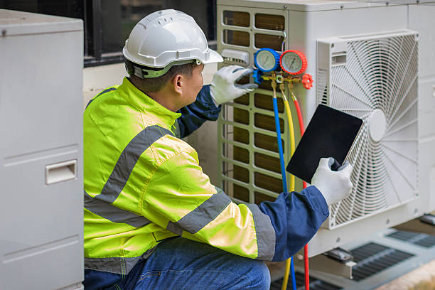 Professional Ductwork Repair technician working in Dover, MA